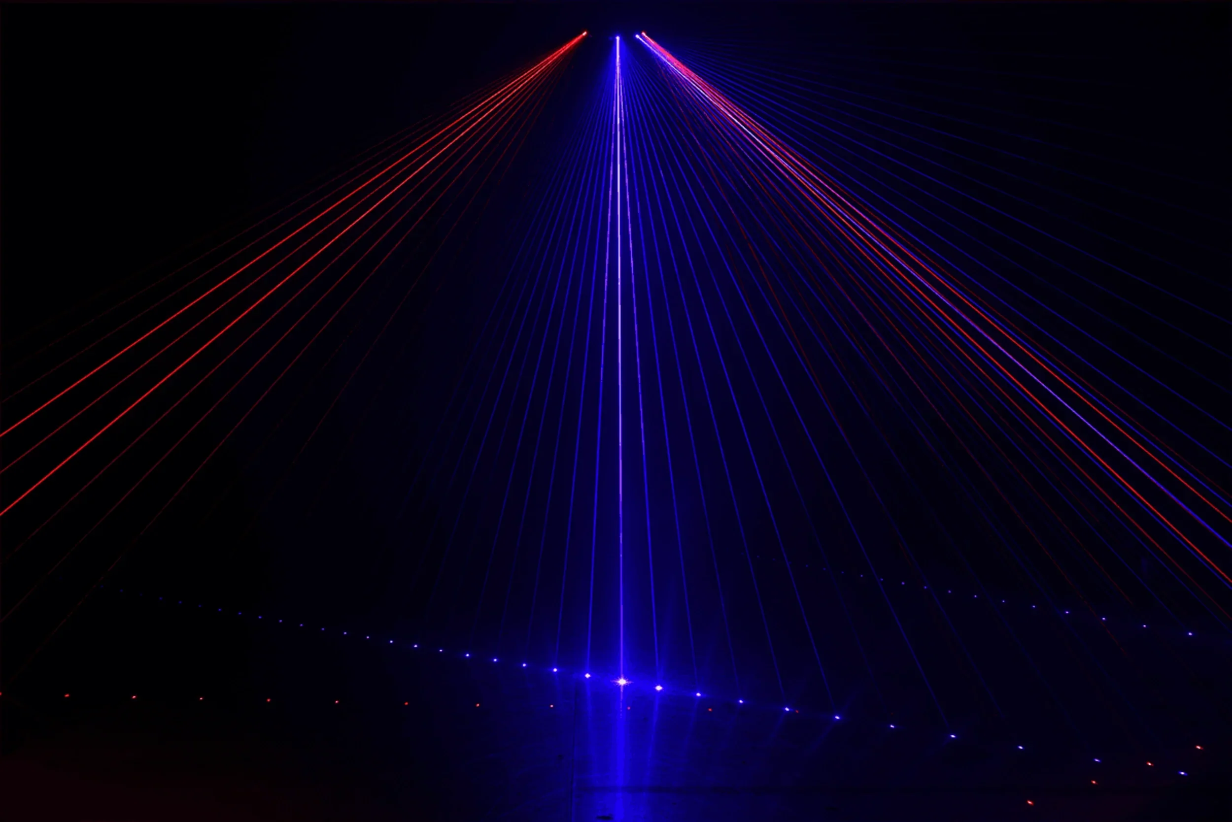 Algam Lighting 6-Beam 360mW RGB entertainment laser projector creating vibrant multicolour beams for DJs, clubs, stage shows, and event lightin