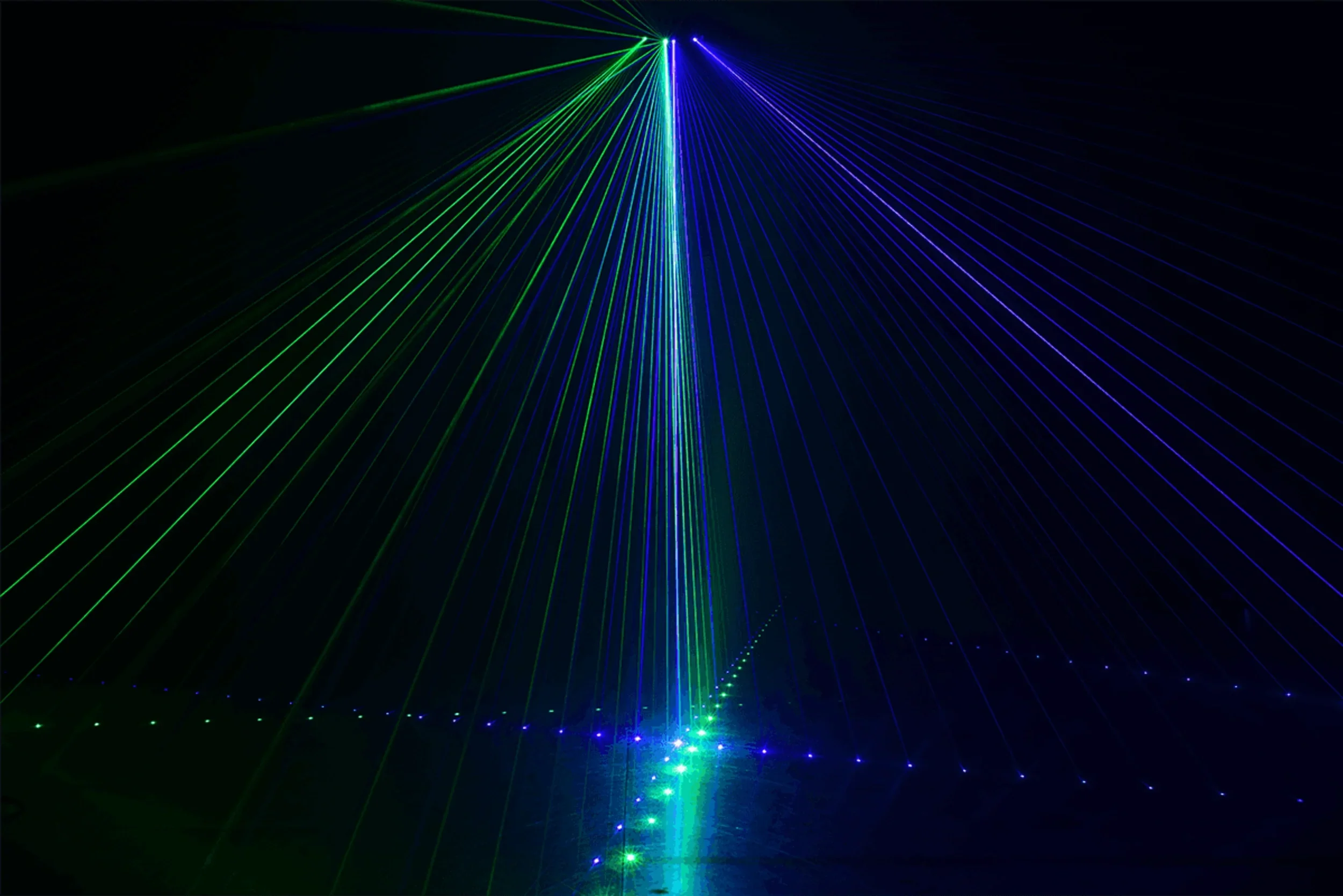Algam Lighting 6-Beam 360mW RGB laser creating colourful effects on stage for DJs and live performances
