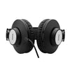 AKG K72 studio headphones worn during music recording session